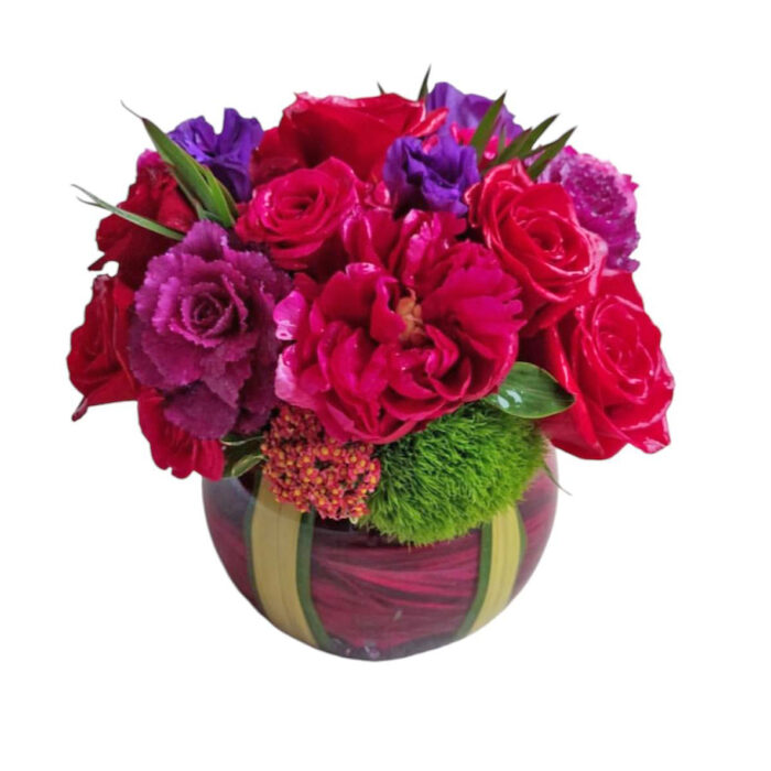 This arrangement exudes contemporary elegance, perfect for a chic centerpiece or a standout gift, combining bold colors with earthy textures for a fresh, lively statement.