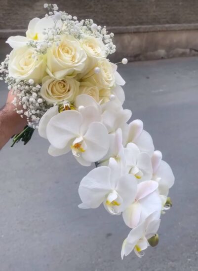 Wedding Bouquet in hands of brida