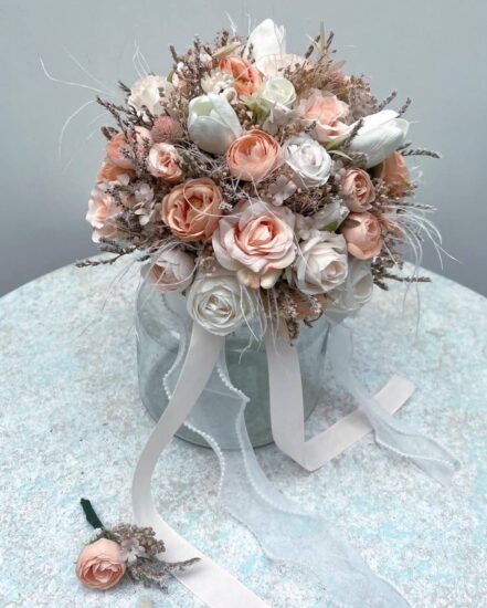 Wedding Bouquet in hands of brida