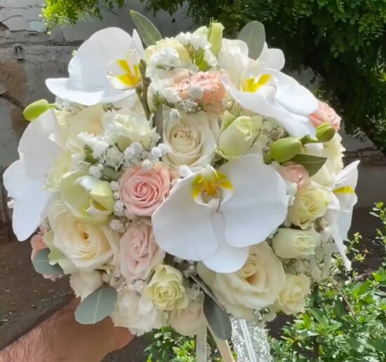 Wedding Bouquet in hands of brida